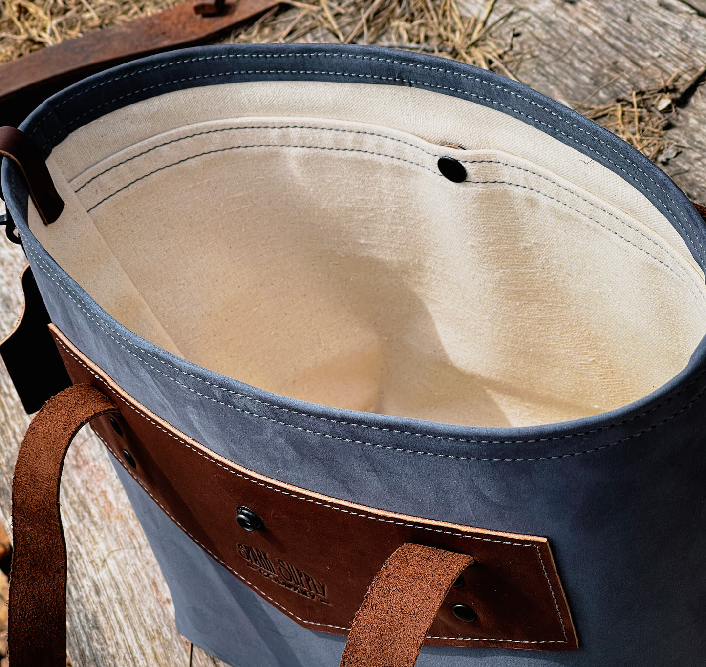 The “Elliott” (Blue with dark brown accents)